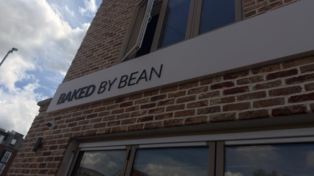 Baked by Bean sign and storefront on Great King Street, Macclesfield